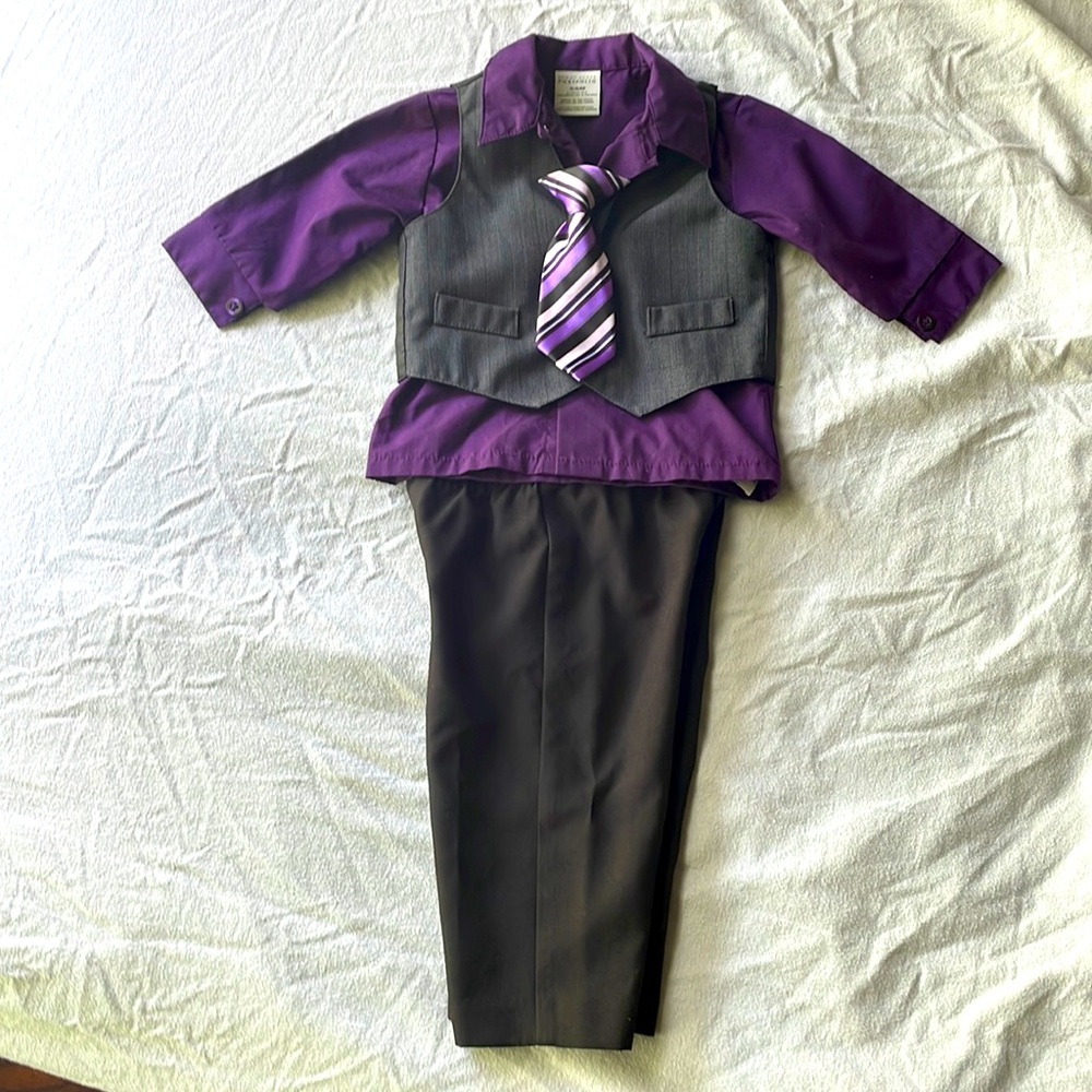 A purple and black tuxedo set for babies.